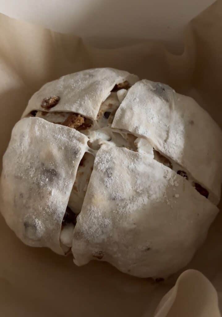 s'mores sourdough bread after being cored and placed in a dutch oven before baking.