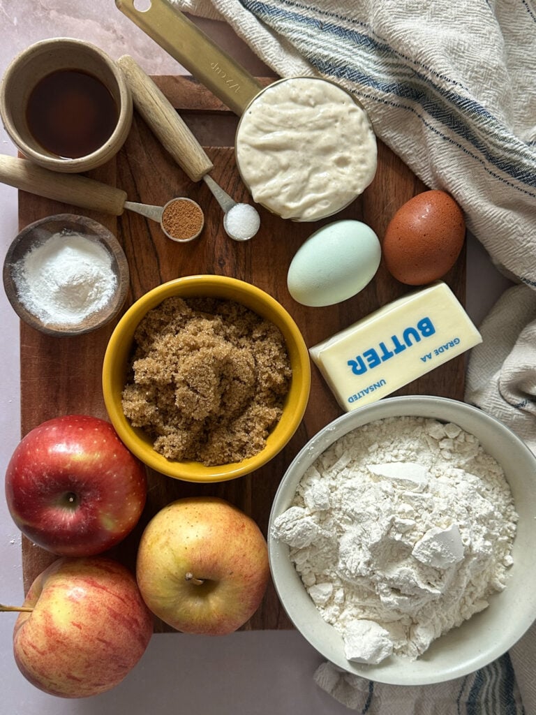 sourdough discard apple bread ingredients measured out in individual cups and bowls.